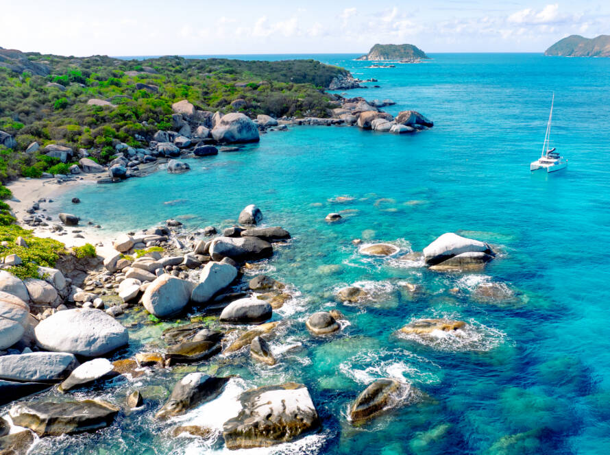 Crewed catamaran moored at The Baths Virgin Gorda on a BVI cabin charter square
