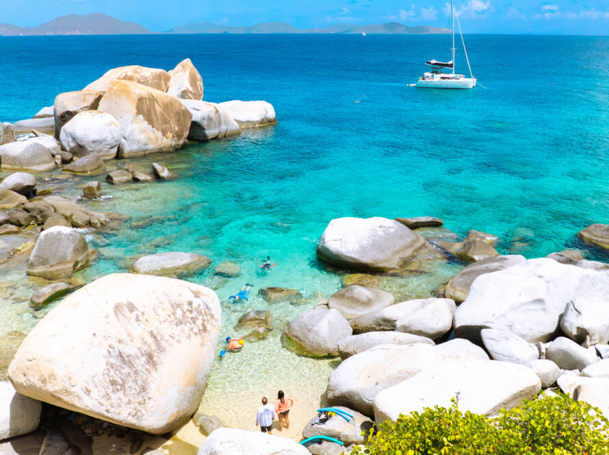 Snorkellers exploring a coral reef at one of the best BVI snorkelling spots